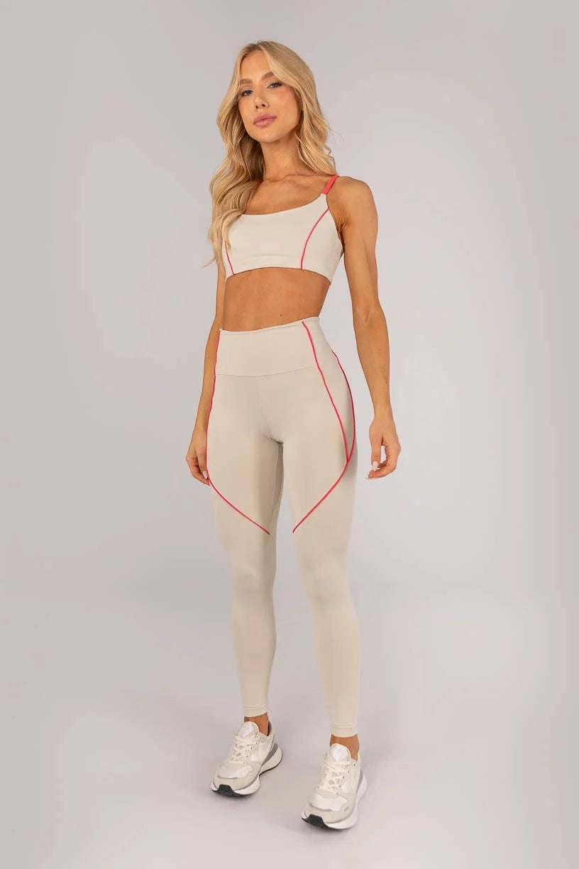 Calça Legging com Bolso e Vivo nas Laterais (Bege / Rosa Pink)