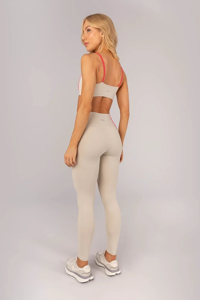 Calça Legging com Bolso e Vivo nas Laterais (Bege / Rosa Pink)